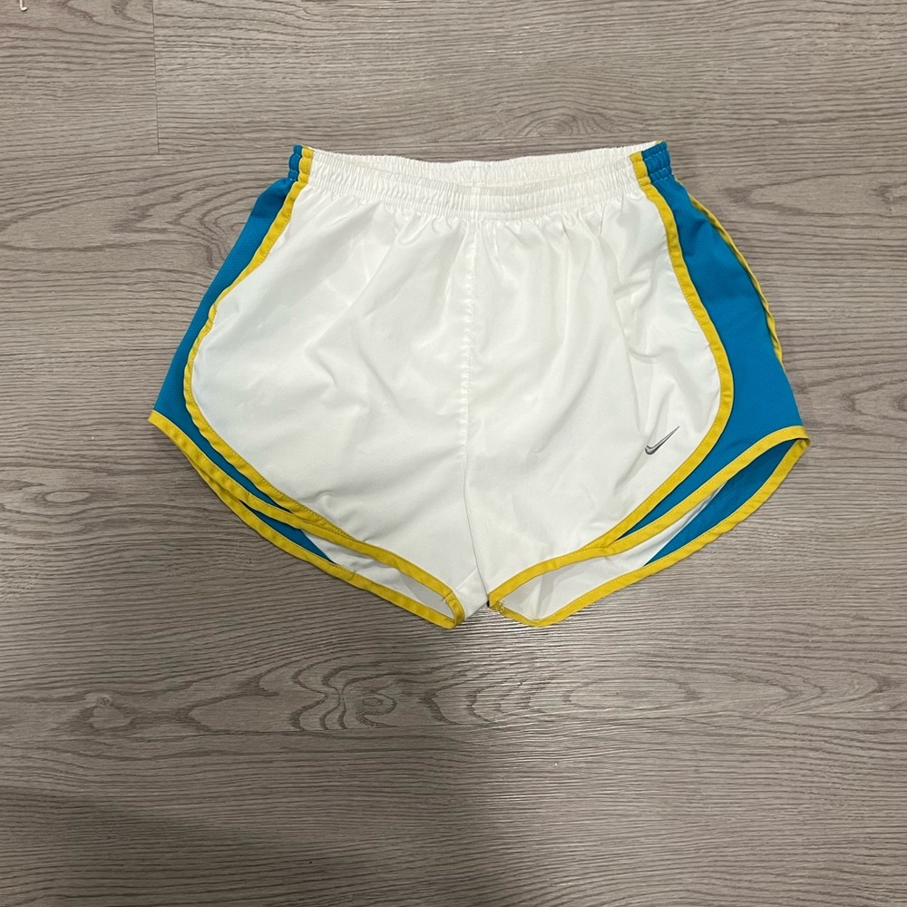 NIKE - women’s white athletic shorts w/ blue & yellow, size S, great condition